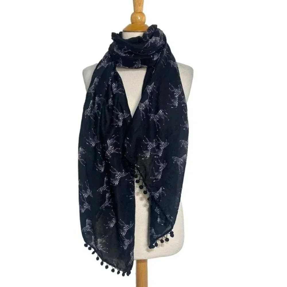 Black & white zebra print scarf with pom pom‎ trim